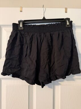 Others Follow Black High-Waist Smocked Ruffle Hem Shorts